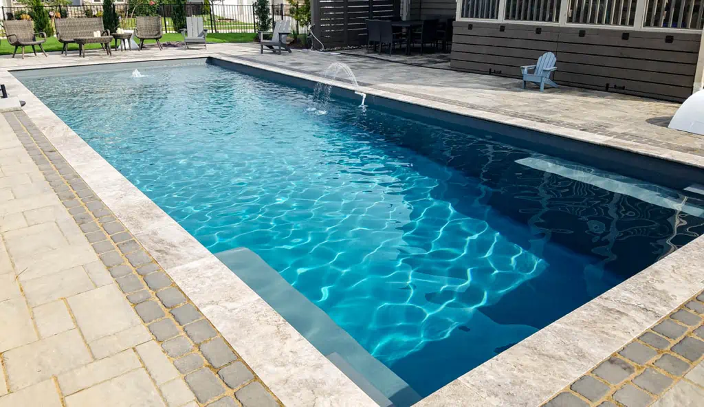 The Pinnacle swimming pool design by Leisure Pools: shown in graphite grey color