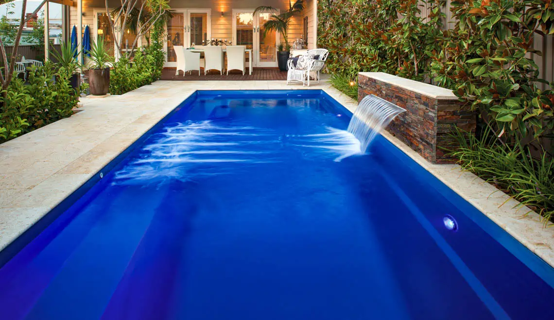 The Harmony swimming pool by Leisure Pools. In Sapphire blue color