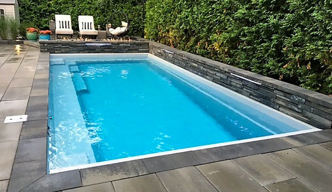 The Reflection swimming pool design by Leisure Pools. In Silver grey color