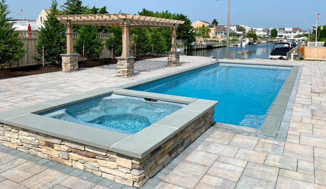 The Supreme swimming pool by Leisure Pools. In Silver grey color